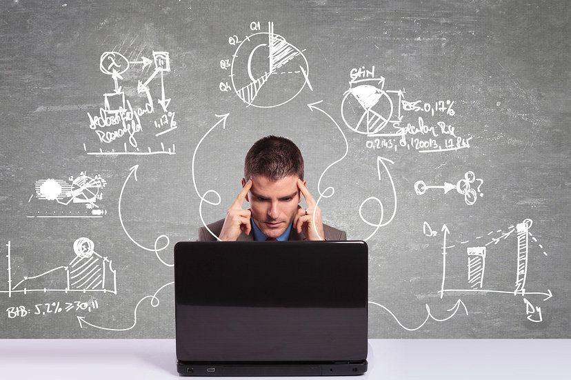 Programmers are in front of their computers, thinking about complex codes and real work processes.